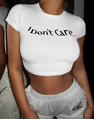 I Don’t Care Baby Tee for Women – White Cropped Graphic Top