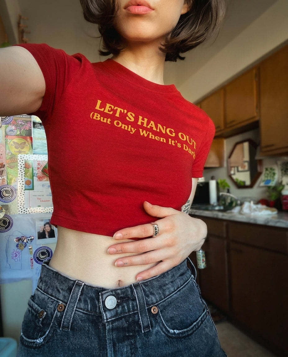 “Let’s Hang Out (But Only When It’s Dark) – Viral Red Baby Tee”